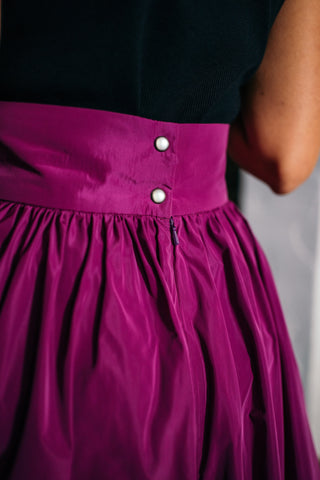 Magenta krāsas svārki ar kabatām