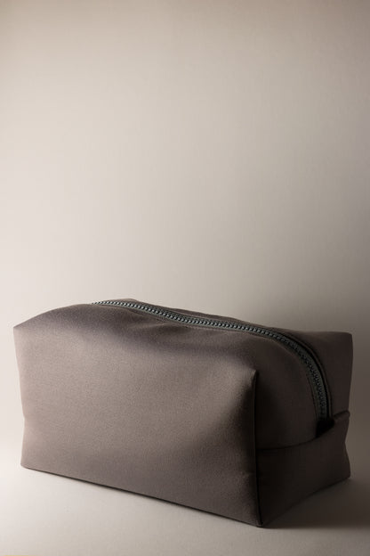 gray boxy cosmetic bag